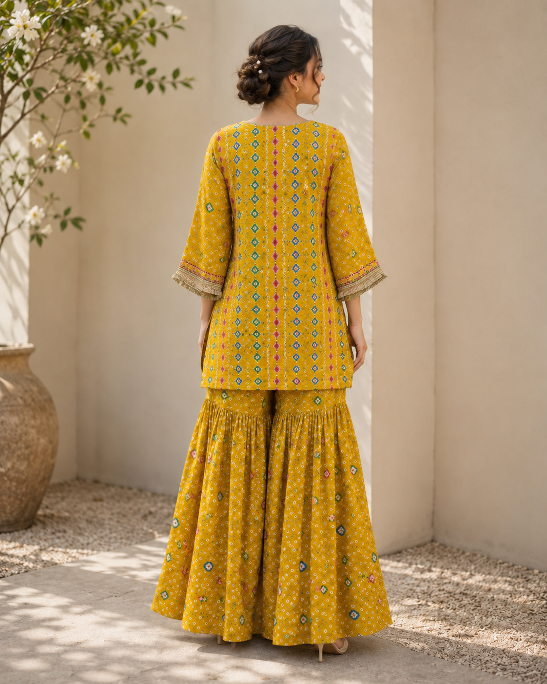 Raiza Ikat Bandhini Peplum Sharara Set