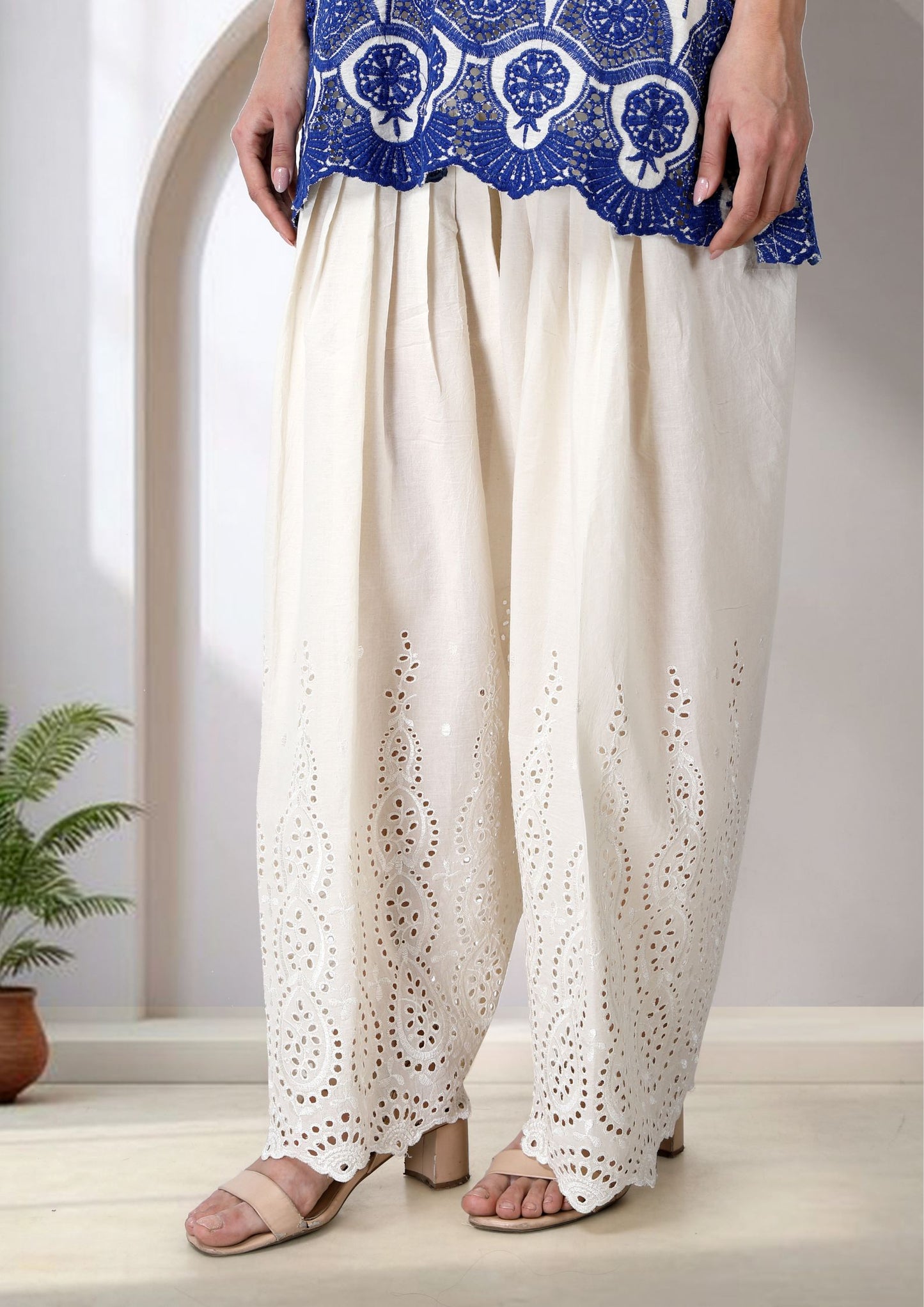 White And Blue Embroidered Cotton Mul Kurta Set.