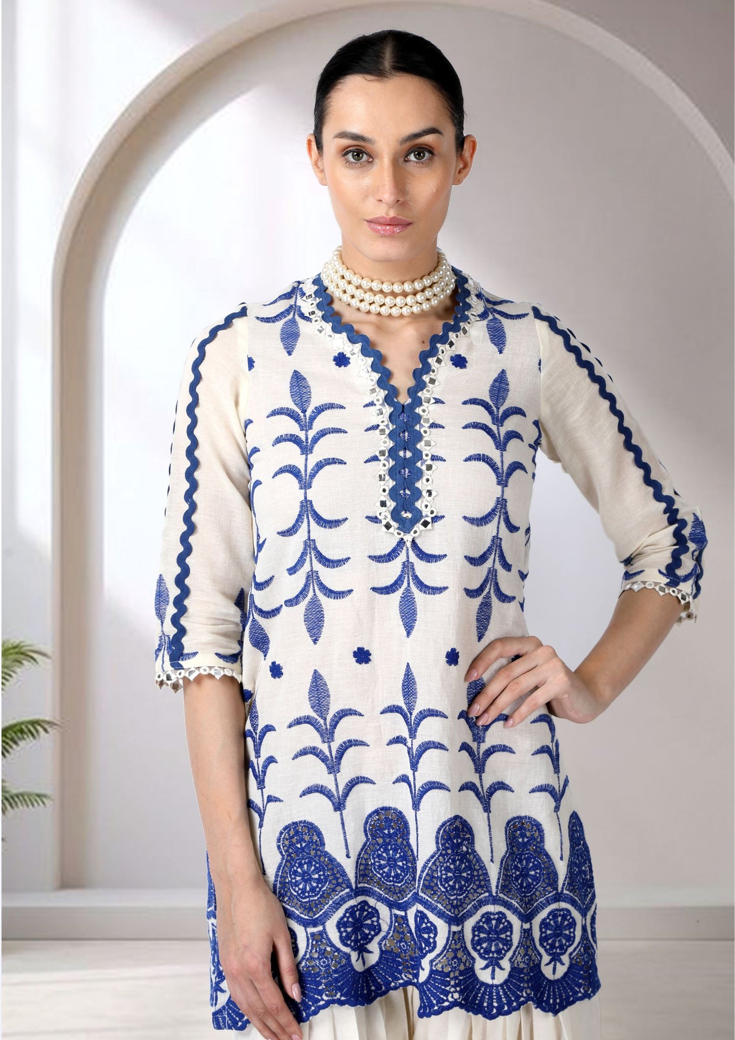 White And Blue Embroidered Cotton Mul Kurta Set.