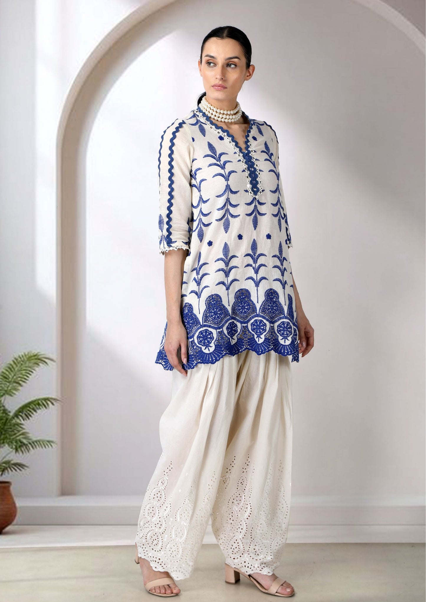 White And Blue Embroidered Cotton Mul Kurta Set.